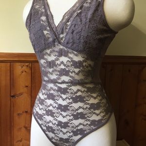 Purple lace body suit with open back